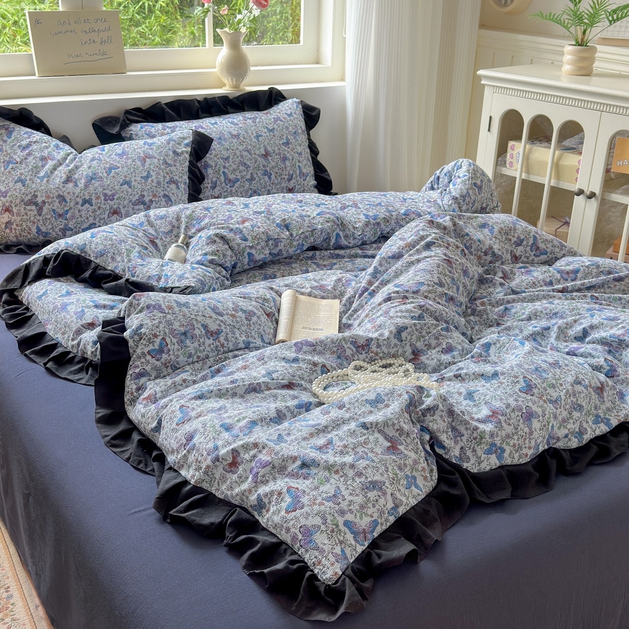 91家纺网 家纺一手货源 找家纺 喜颜 2025新款云感提花皱皱棉爆款花边四件套-赫本风 炫彩蝴蝶