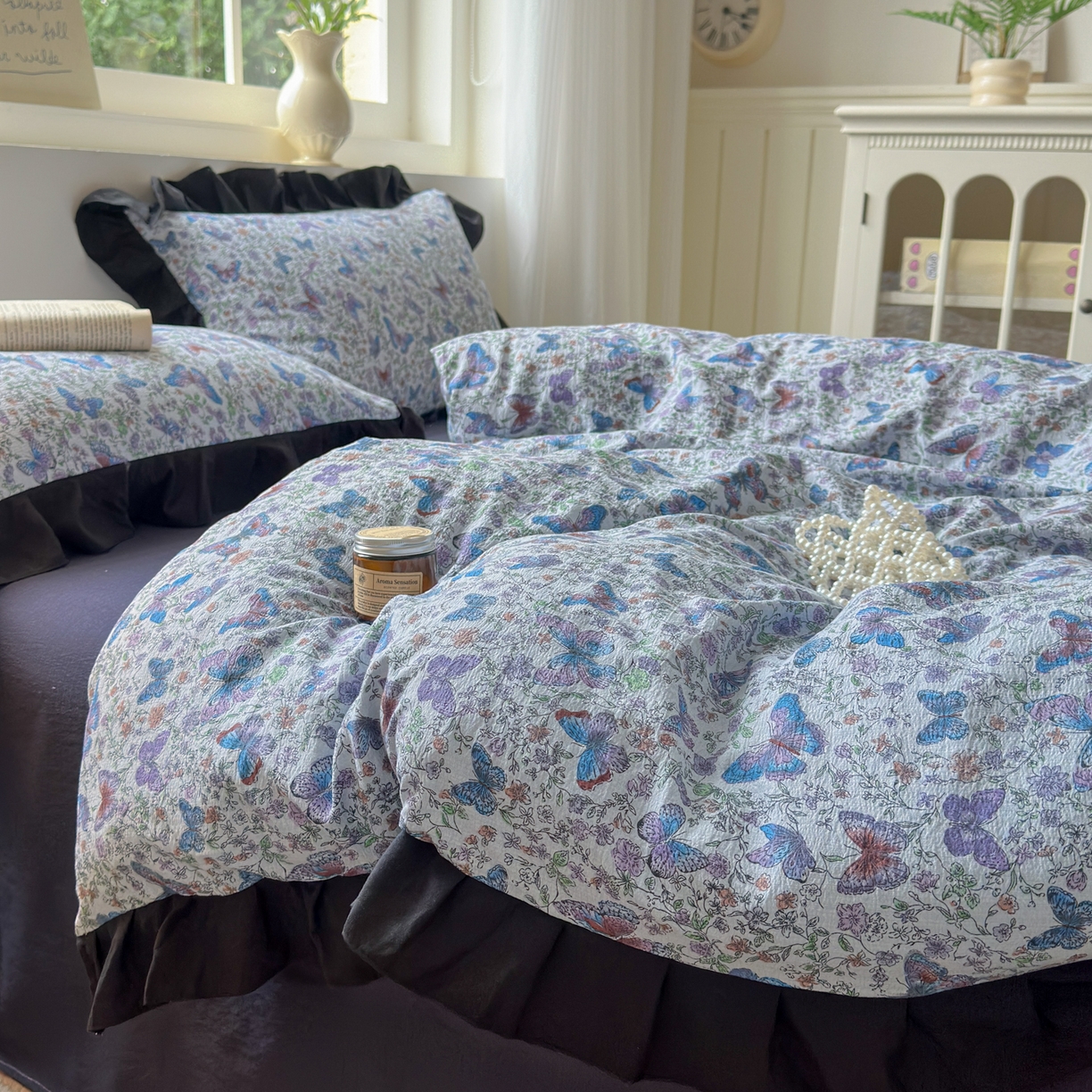 91家纺网 家纺一手货源 找家纺 喜颜 2025新款云感提花皱皱棉爆款花边四件套-赫本风 炫彩蝴蝶