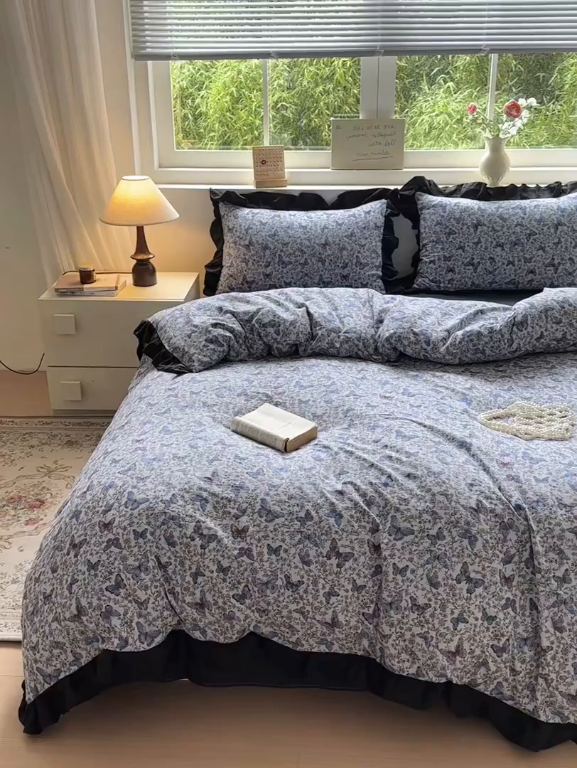 91家纺网 家纺一手货源 找家纺 喜颜 2025新款云感提花皱皱棉爆款花边四件套-赫本风 炫彩蝴蝶