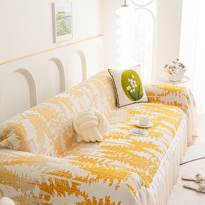 91家纺网 家纺一手货源 找家纺 沐沐家纺 2026春夏新款枝荫沙发巾 枝荫-落日黄