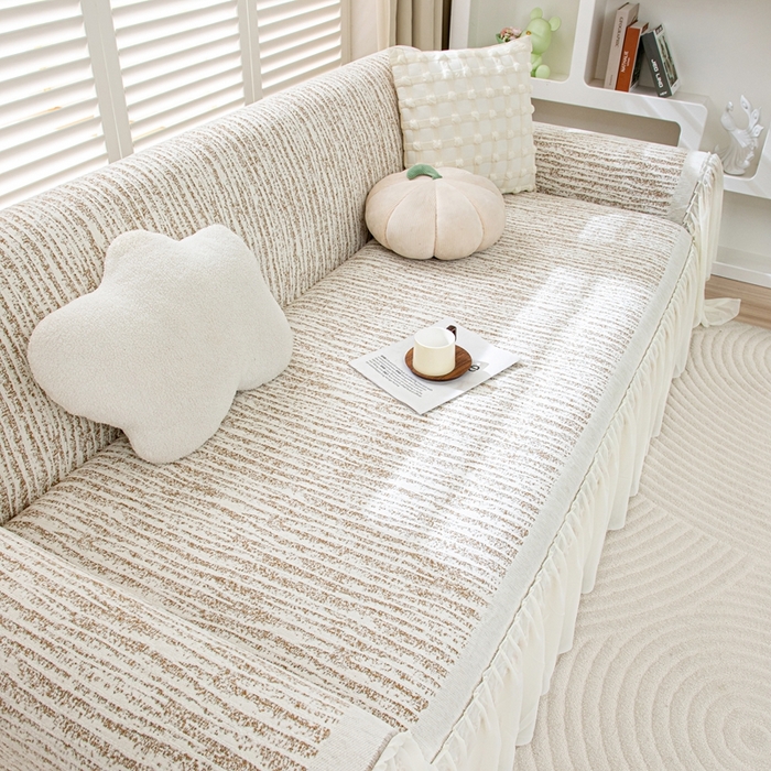 91家纺网 家纺一手货源 找家纺 沐沐家纺 2026春夏新款宛柔裙边沙发巾 宛柔裙边-驼色