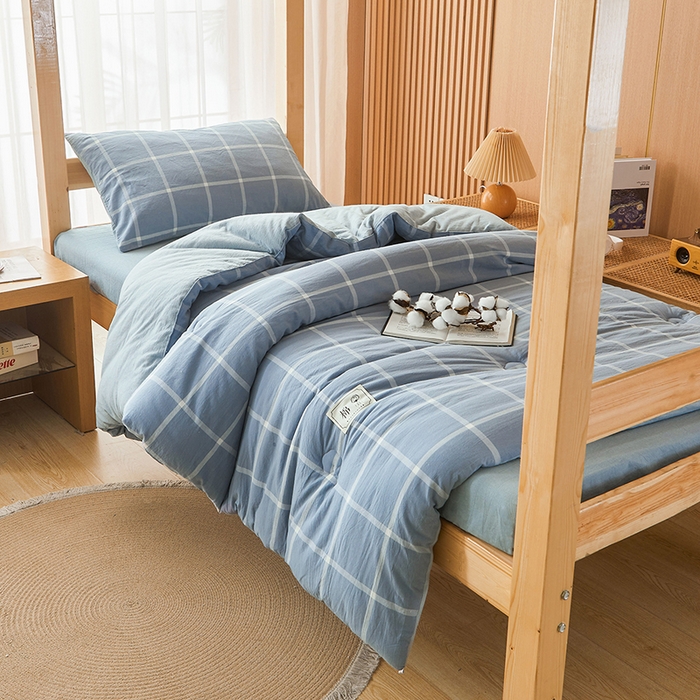 91家纺网 家纺一手货源 找家纺 熙宴家纺 2025新款无印风100%新疆棉花被学生床被子被芯 海蓝中格