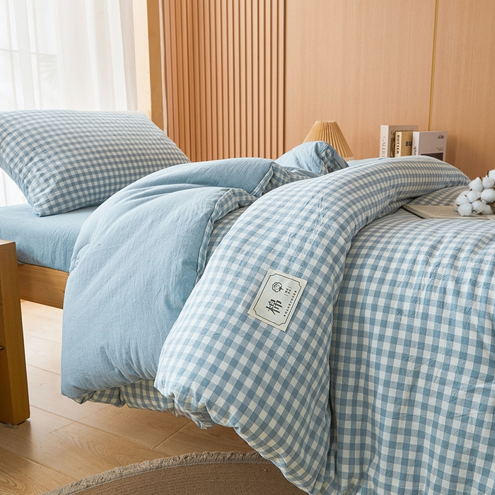 91家纺网 家纺一手货源 找家纺 熙宴家纺 2025新款无印风100%新疆棉花被学生床被子被芯 蓝小格