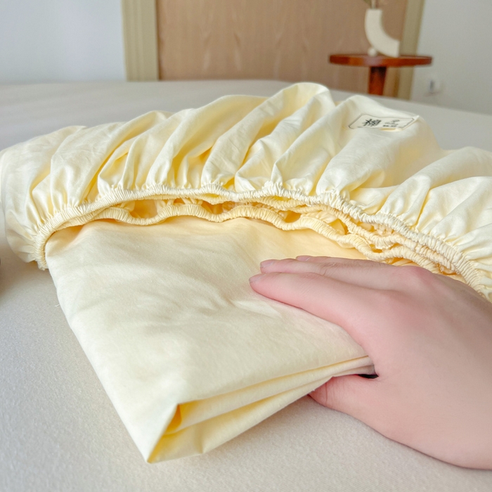 91家纺网 家纺一手货源 找家纺 暖芯优选 2025新款40S13376纯色全棉水洗棉单品系列床笠单件-单床笠 奶油黄