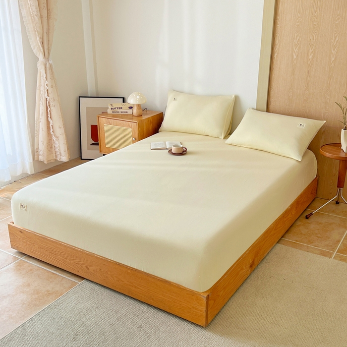 91家纺网 家纺一手货源 找家纺 暖芯优选 2025新款40S13376纯色全棉水洗棉单品系列床笠单件-单床笠 奶油黄