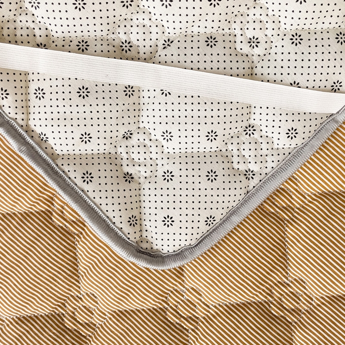 91家纺网 家纺一手货源 找家纺 纽缦家纺 2025新款云朵棉加厚夹棉床垫床护垫 小黄条