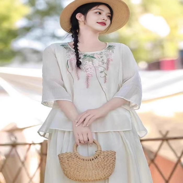 91家纺网 家纺一手货源 找家纺 （总）洛兰沙家居馆【只代发】【只代发】 2025春夏新款刺绣苎麻显瘦立领斜襟盘扣七分袖T恤上衣女