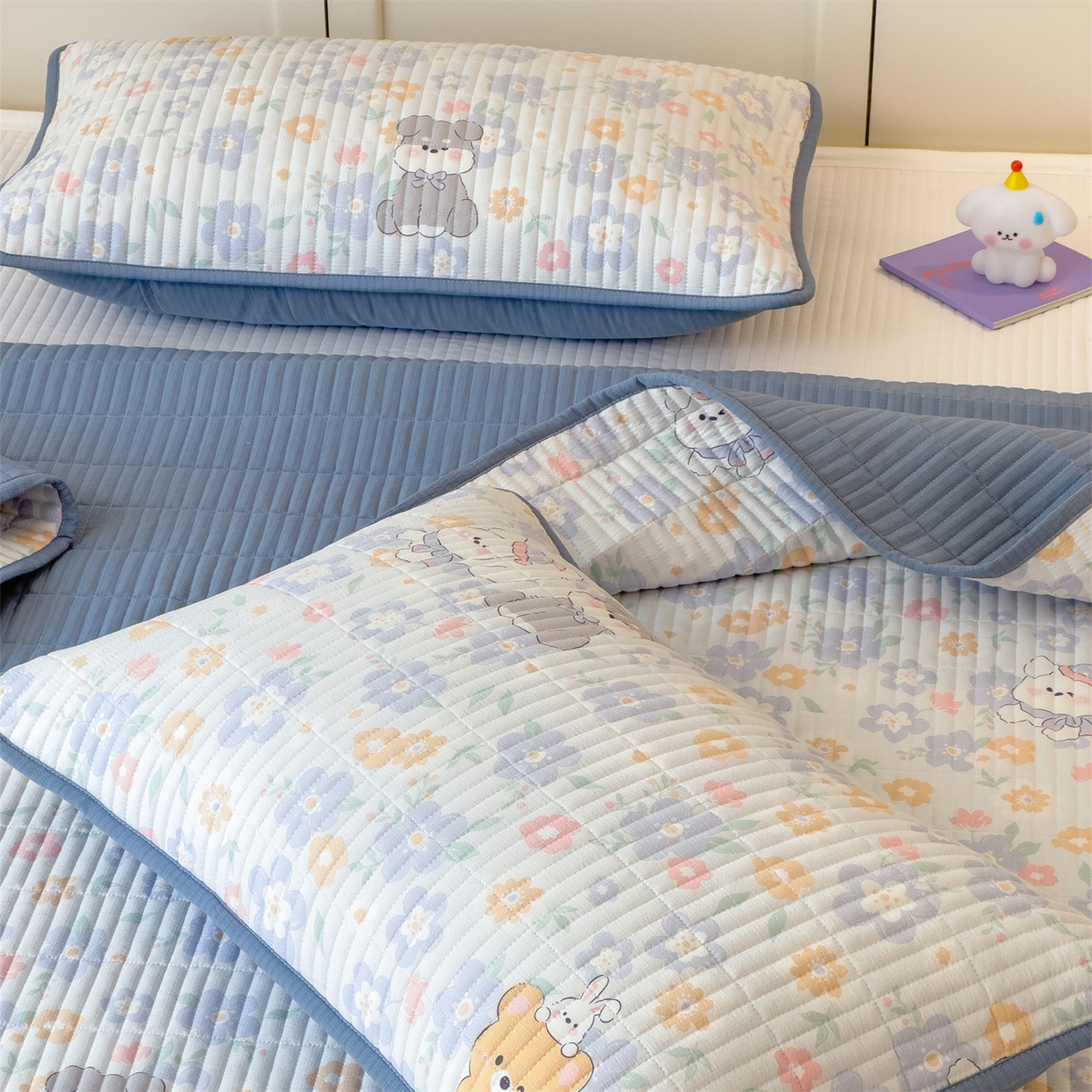 91家纺网 家纺一手货源 找家纺 雯豆家纺 2025新品皱皱双层纱床盖泡泡纱床罩保护套 奶萌小狗