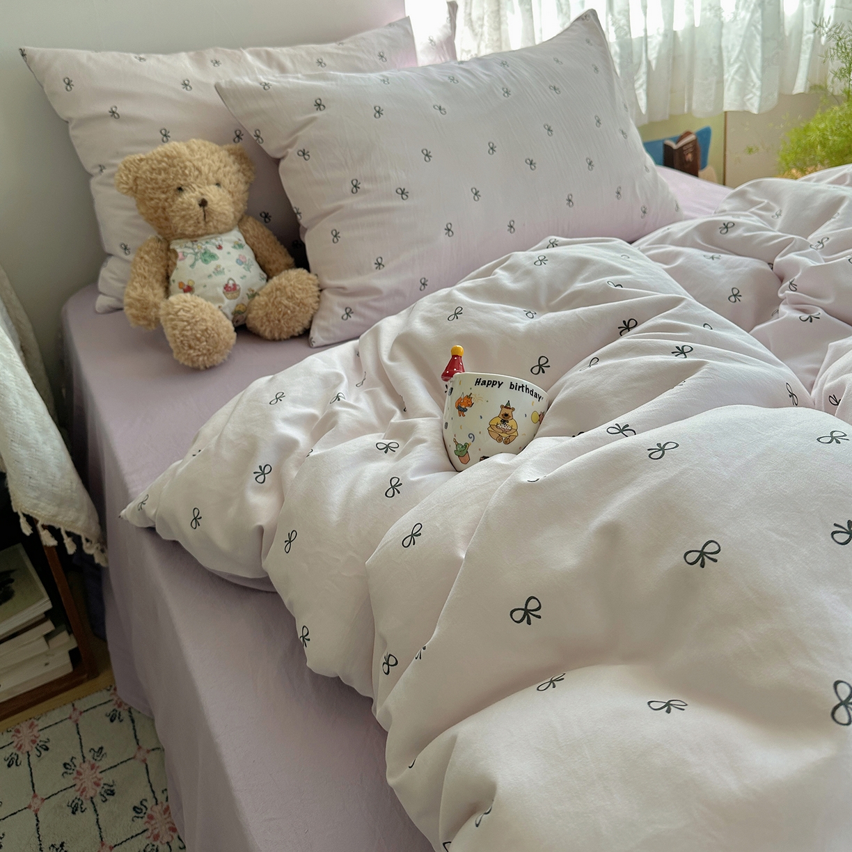 91家纺网 家纺一手货源 找家纺 沐芷 2025 开学季水洗棉四件套A类 卡通简约风超柔舒适三件套 紫色蝴蝶结