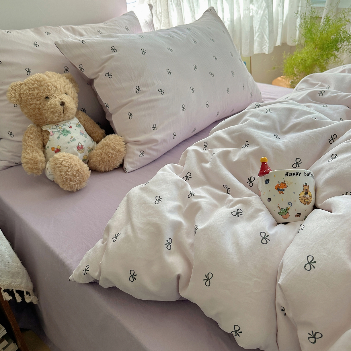 91家纺网 家纺一手货源 找家纺 沐芷 2025 开学季水洗棉四件套A类 卡通简约风超柔舒适三件套 紫色蝴蝶结