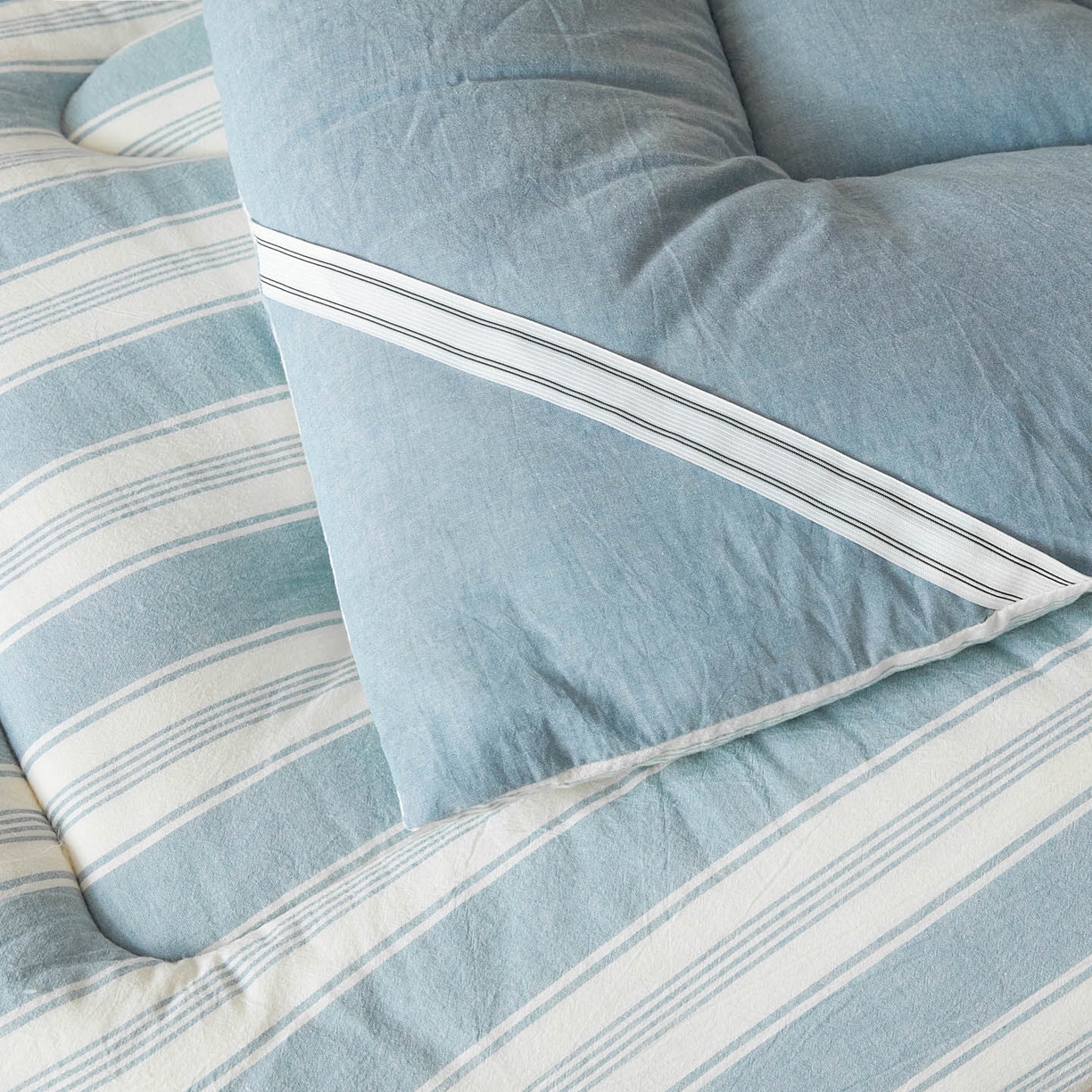 91家纺网 家纺一手货源 找家纺 爱屋及屋 2025款无印风学生棉花床垫 左岸蓝