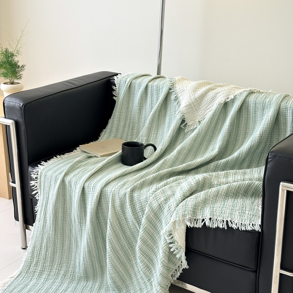 91家纺网 家纺一手货源 找家纺 淑女公社家纺 2025新款双色全棉纯棉皱皱纱流苏毯 双色流苏毯 条纹水绿