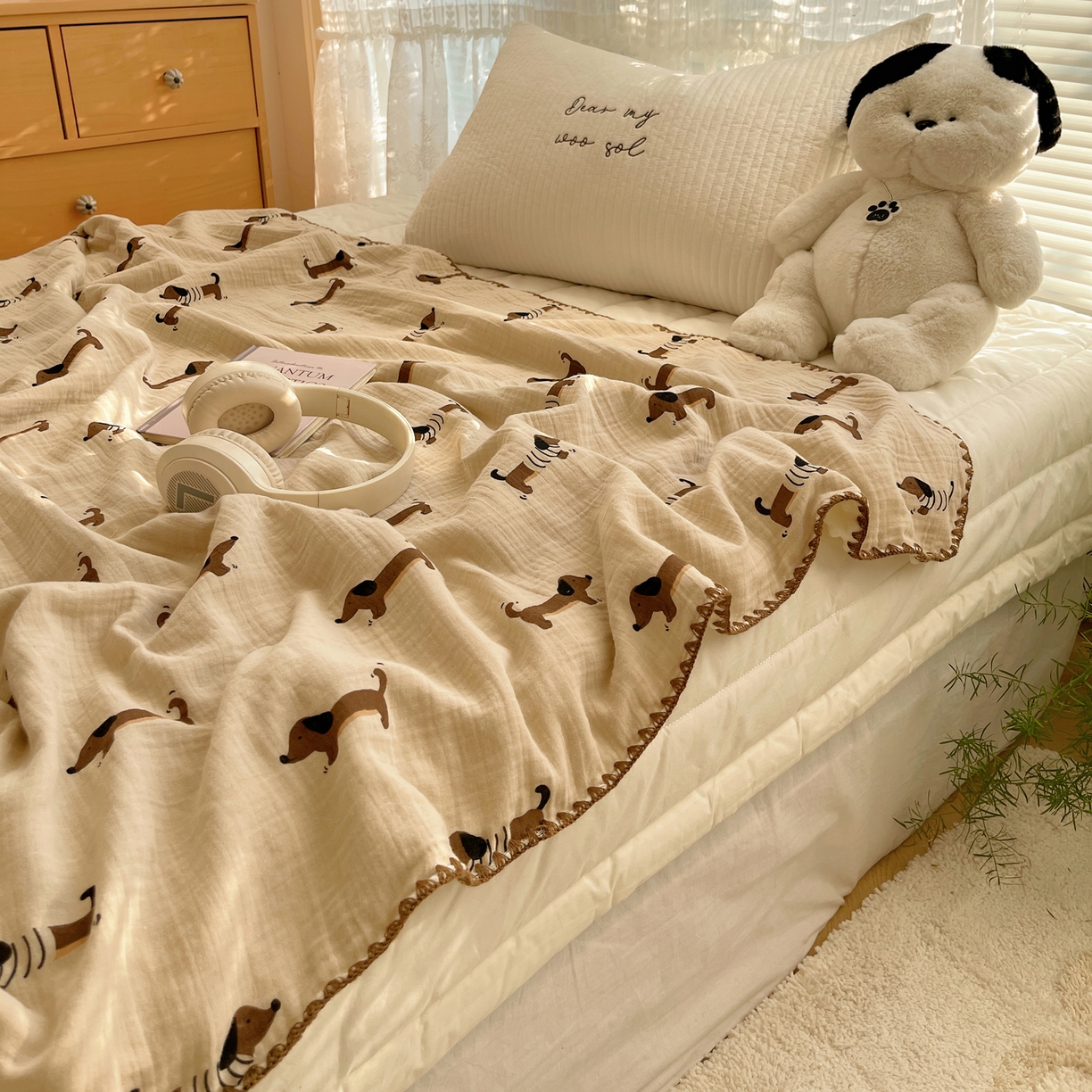 91家纺网 家纺一手货源 找家纺 三朵家纺 2025新款全棉纯棉绉绉纱+宝宝绒多功能毯盖毯毯子 萌萌狗