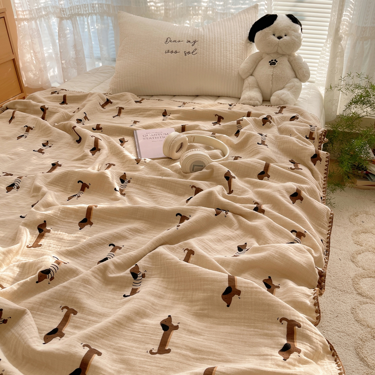 91家纺网 家纺一手货源 找家纺 三朵家纺 2025新款全棉纯棉绉绉纱+宝宝绒多功能毯盖毯毯子 萌萌狗