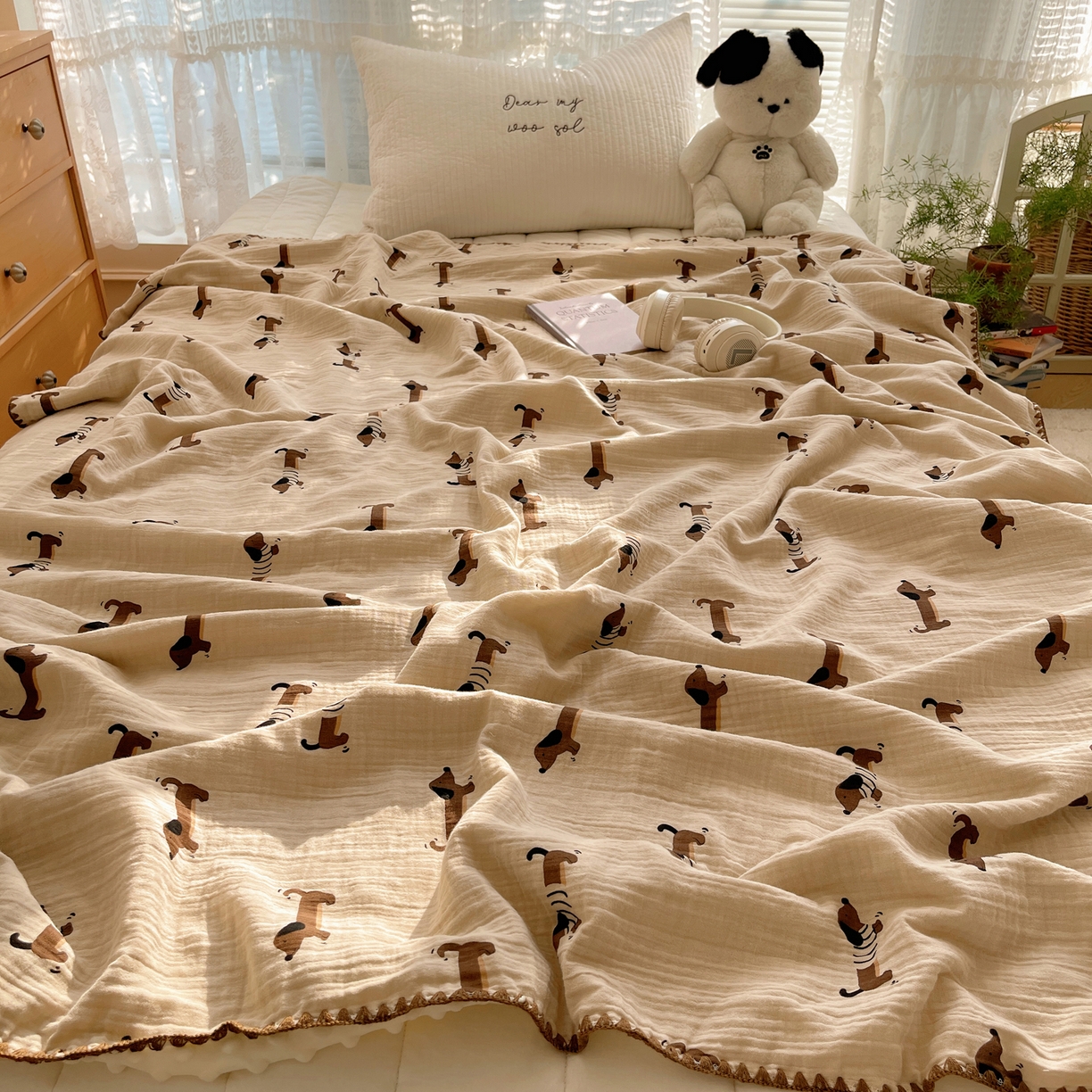 91家纺网 家纺一手货源 找家纺 三朵家纺 2025新款全棉纯棉绉绉纱+宝宝绒多功能毯盖毯毯子 萌萌狗