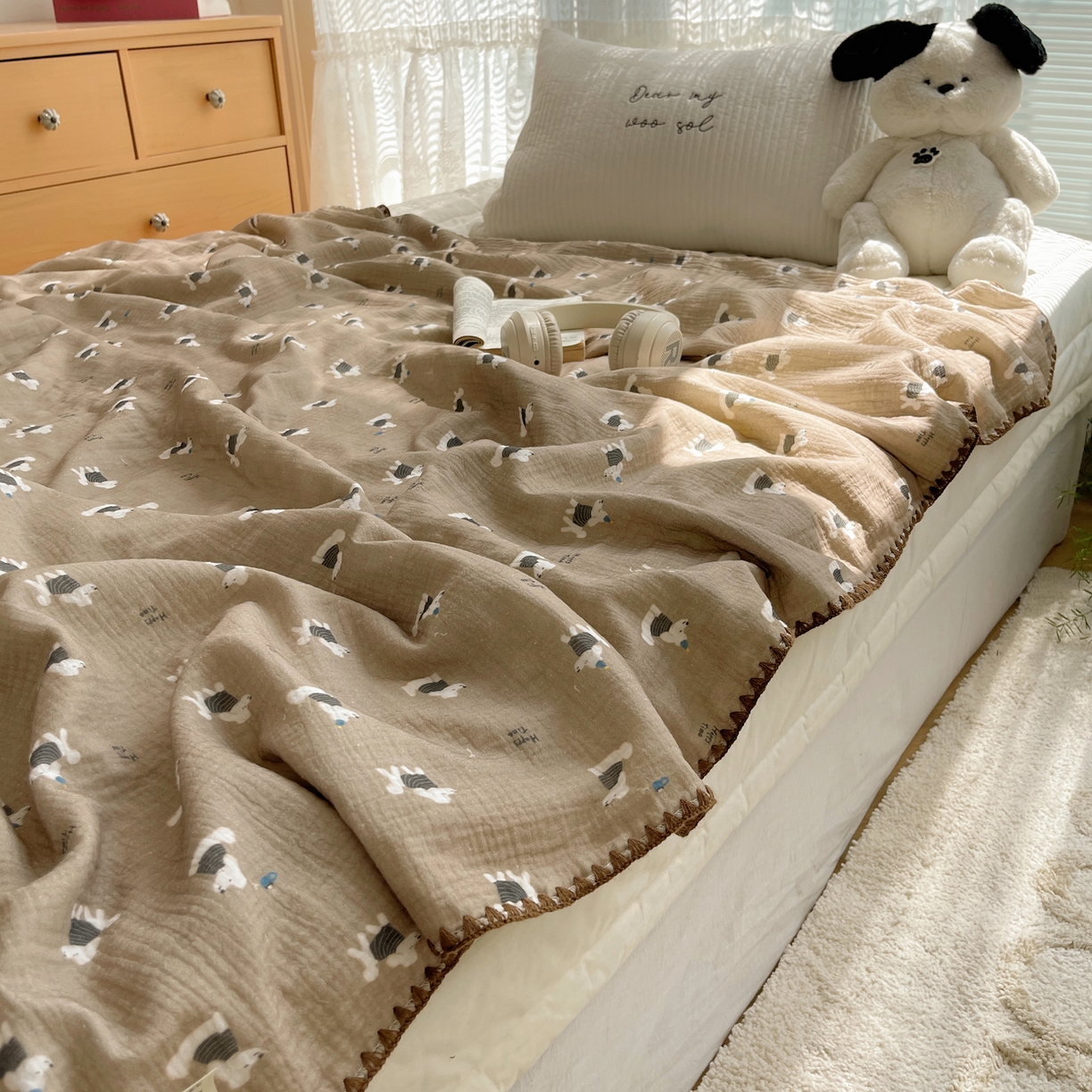 91家纺网 家纺一手货源 找家纺 三朵家纺 2025新款全棉纯棉绉绉纱+宝宝绒多功能毯盖毯毯子 甜心狗