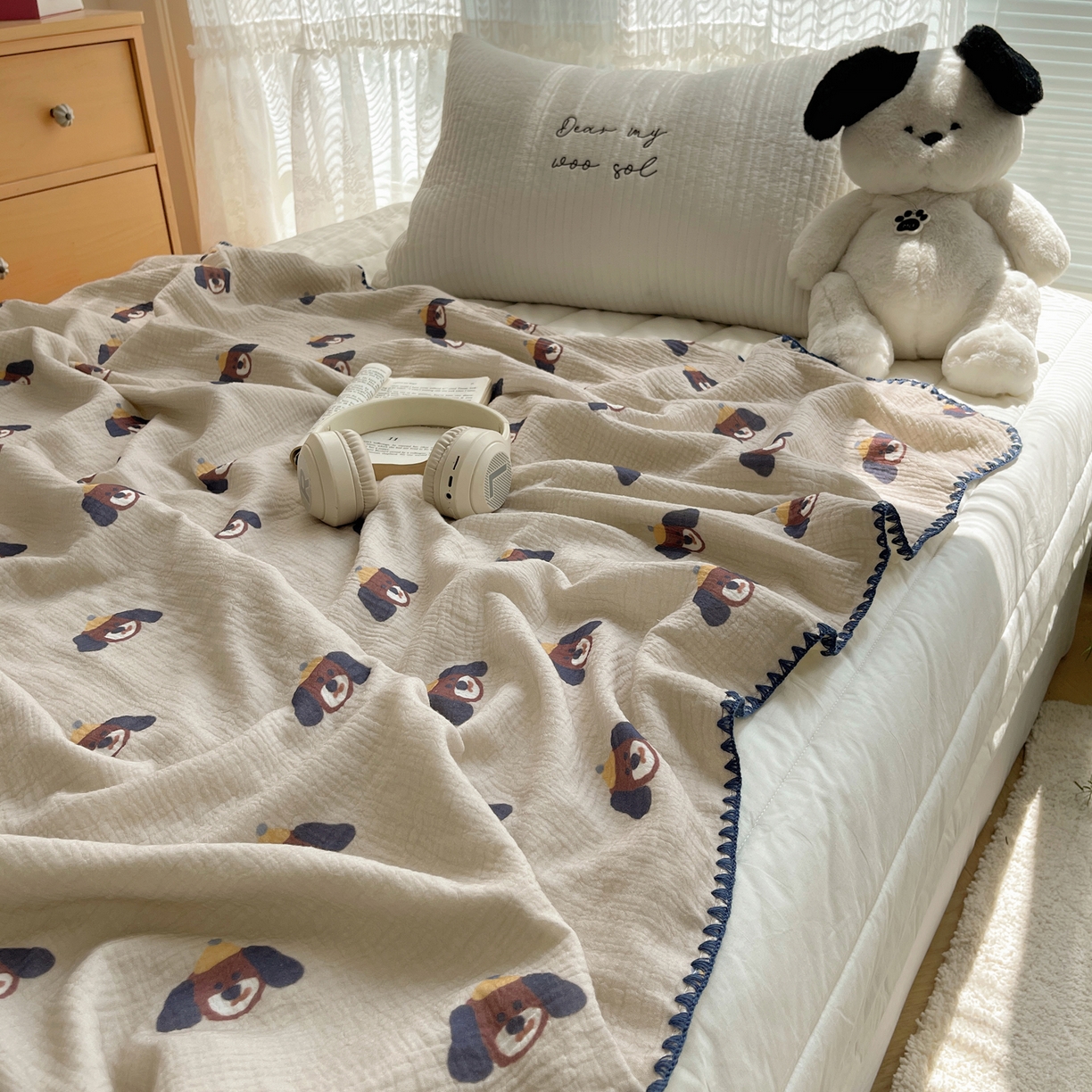 91家纺网 家纺一手货源 找家纺 三朵家纺 2025新款全棉纯棉绉绉纱+宝宝绒多功能毯盖毯毯子 大耳狗