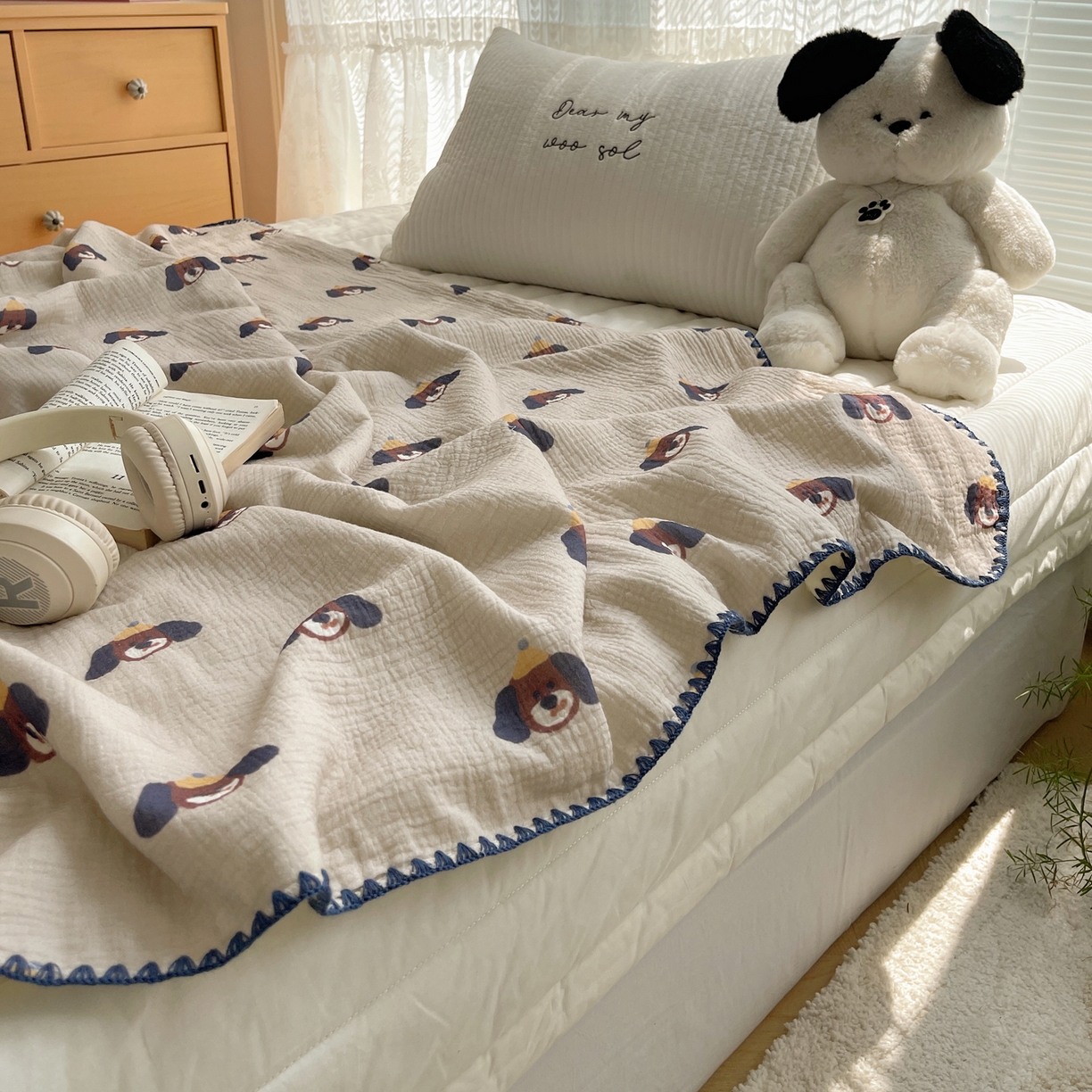 91家纺网 家纺一手货源 找家纺 三朵家纺 2025新款全棉纯棉绉绉纱+宝宝绒多功能毯盖毯毯子 大耳狗