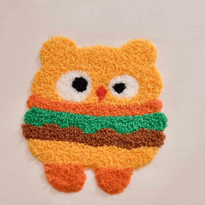 91家纺网 家纺一手货源 找家纺 炫拼家纺 2026新春款萌系A类全棉纯棉40支水洗棉毛巾绣四件套 快乐汉堡