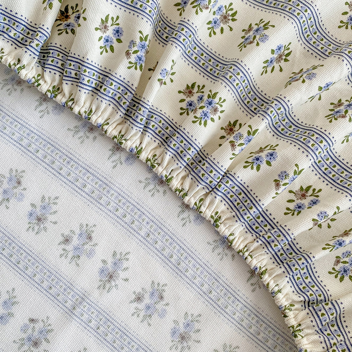 91家纺网 家纺一手货源 找家纺 首爱家纺 2025新款升级细纱原棉老粗布印花单床笠床笠单件单品床笠 蓝心