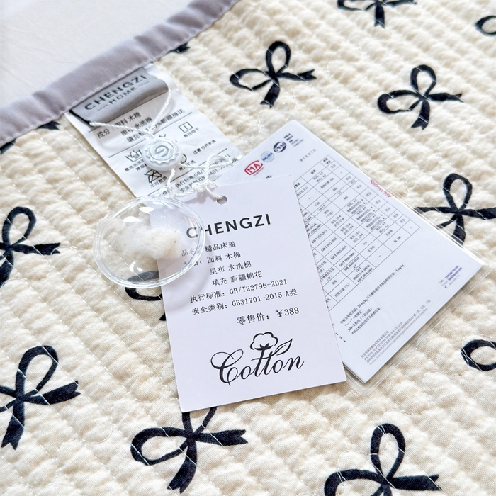 91家纺网 家纺一手货源 找家纺 橙子家居 2024新款A类木棉印花夹层新疆棉花四季款床盖三件套 蝴蝶结