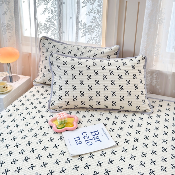 91家纺网 家纺一手货源 找家纺 橙子家居 2024新款A类木棉印花夹层新疆棉花四季款床盖三件套 蝴蝶结