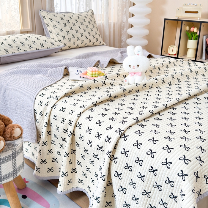 91家纺网 家纺一手货源 找家纺 橙子家居 2024新款A类木棉印花夹层新疆棉花四季款床盖三件套 蝴蝶结