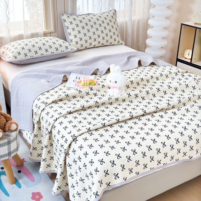 91家纺网 家纺一手货源 找家纺 橙子家居 2024新款A类木棉印花夹层新疆棉花四季款床盖三件套 蝴蝶结