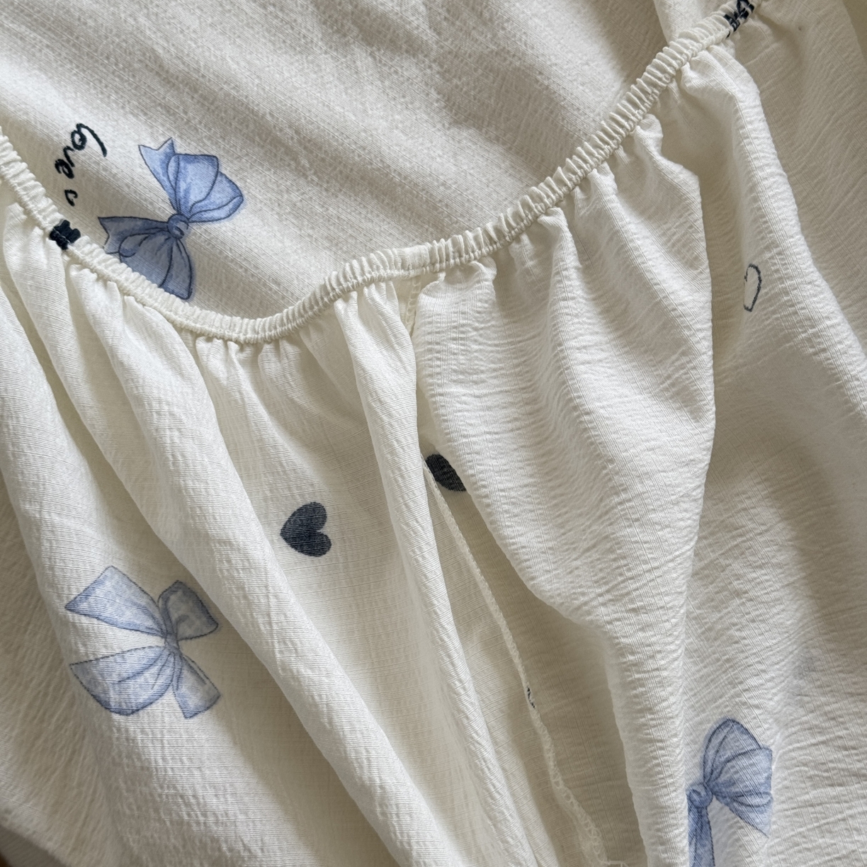 91家纺网 家纺一手货源 找家纺 叠派家纺 2025新款A类双层纱提花单品系列-单床笠 爱心蝴蝶结