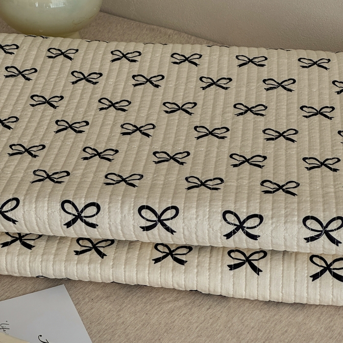 91家纺网 家纺一手货源 找家纺 橙子家居 2024新款A类高温砂洗木棉印花床盖三件套夹层新疆棉花四季款-实拍图 蝴蝶结