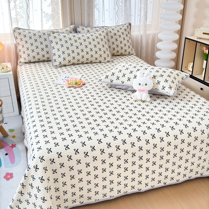 91家纺网 家纺一手货源 找家纺 橙子家居 2024新款A类木棉印花床盖三件套四季款夹层新疆棉花 蝴蝶结