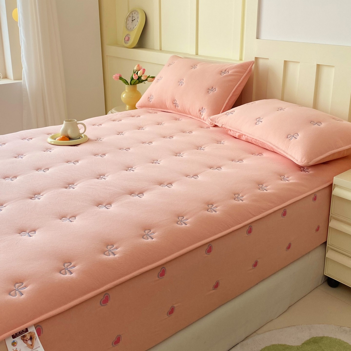 91家纺网 家纺一手货源 找家纺 尊康家纺（原磊科） 2025新款7A抗菌全棉色织水洗棉大豆棉填充床笠-同心结 同心结-粉玉