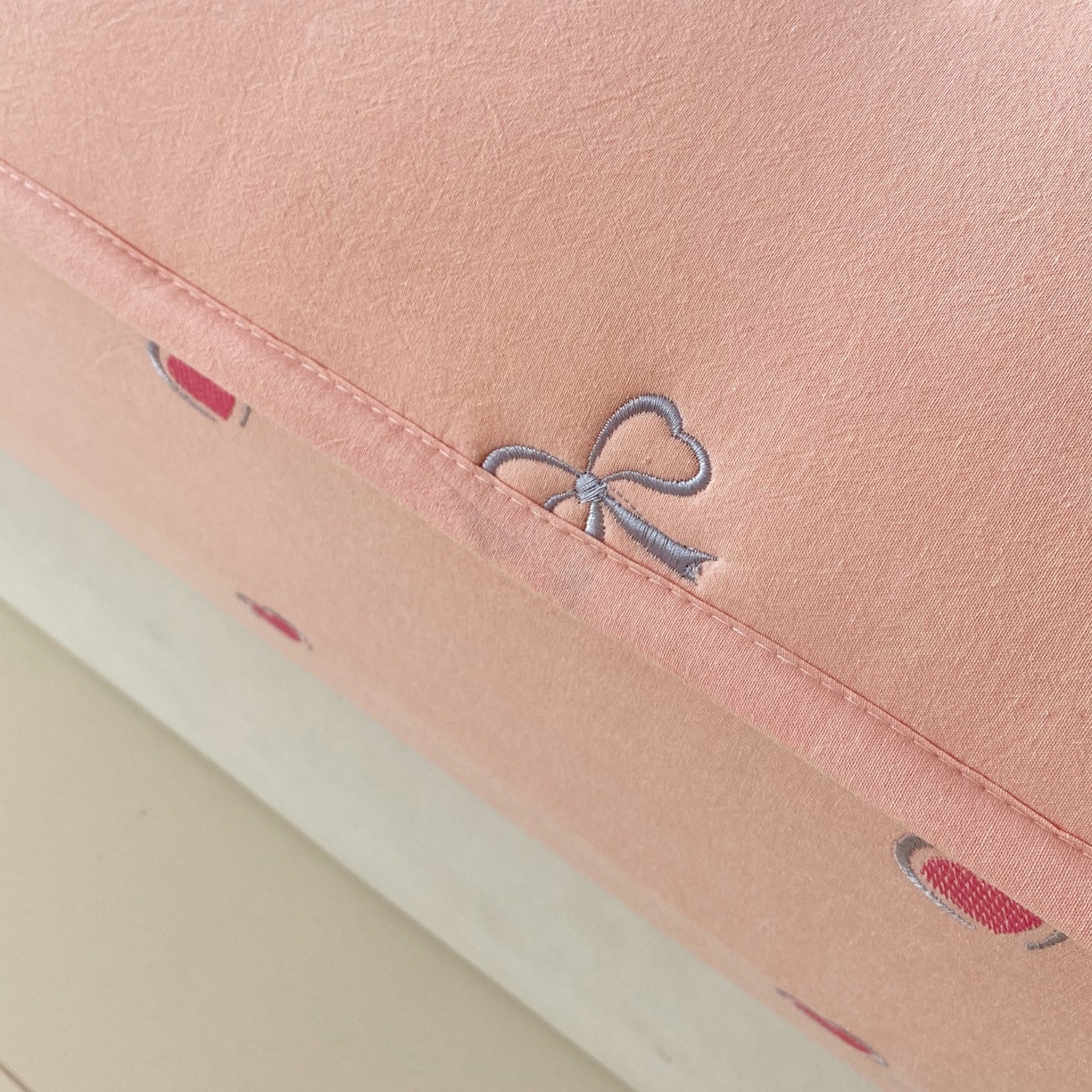 91家纺网 家纺一手货源 找家纺 尊康家纺（原磊科） 2025新款7A抗菌全棉色织水洗棉大豆棉填充床笠-同心结 同心结-粉玉