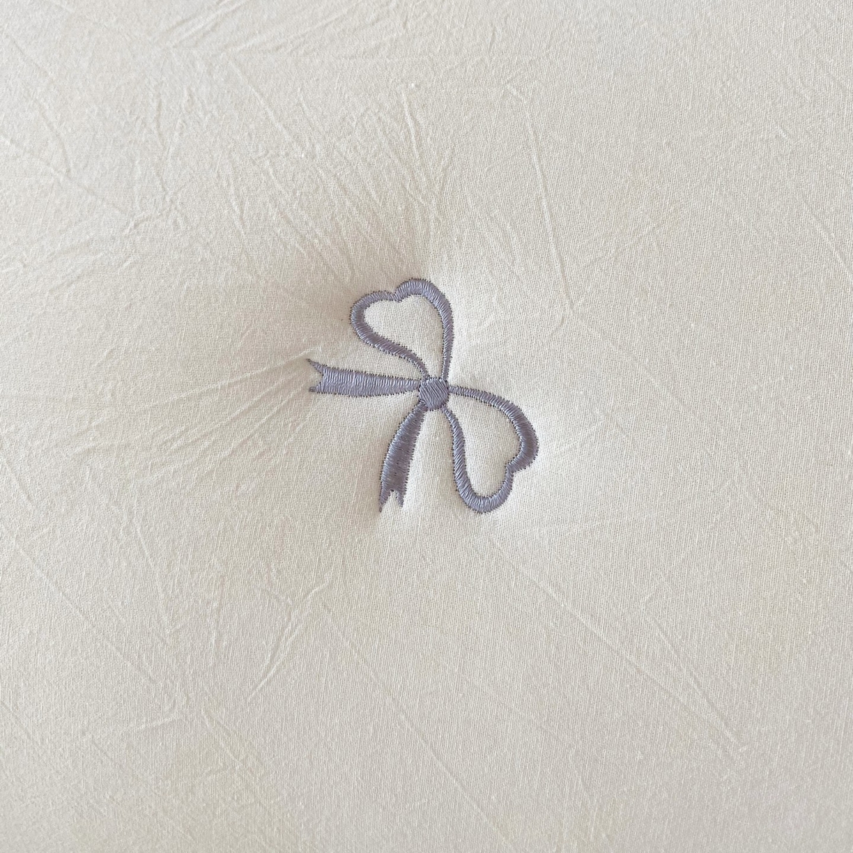 91家纺网 家纺一手货源 找家纺 尊康家纺（原磊科） 2025新款7A抗菌全棉色织水洗棉大豆棉填充床笠-同心结 同心结-白