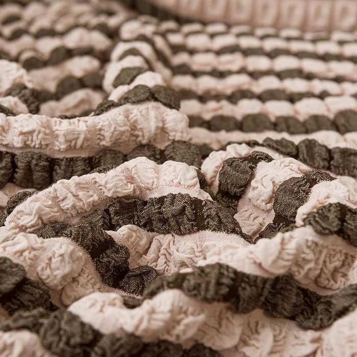 91家纺网 家纺一手货源 找家纺 布兰鸟【沙发套】 2025新款泡泡沙发套【英文裙摆款】单人沙发风格 双色咖