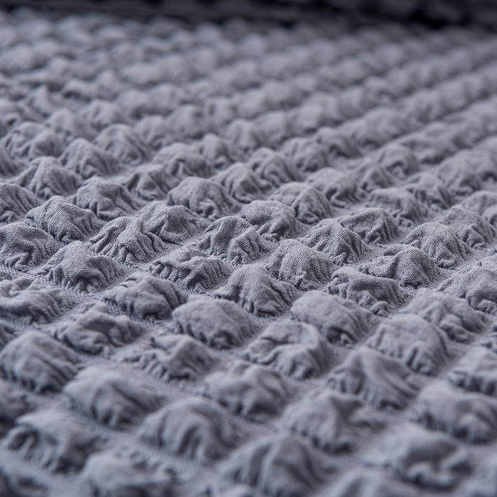 91家纺网 家纺一手货源 找家纺 布兰鸟【沙发套】 2025新款泡泡沙发套【英文裙摆款】三人沙发风格 单色中灰