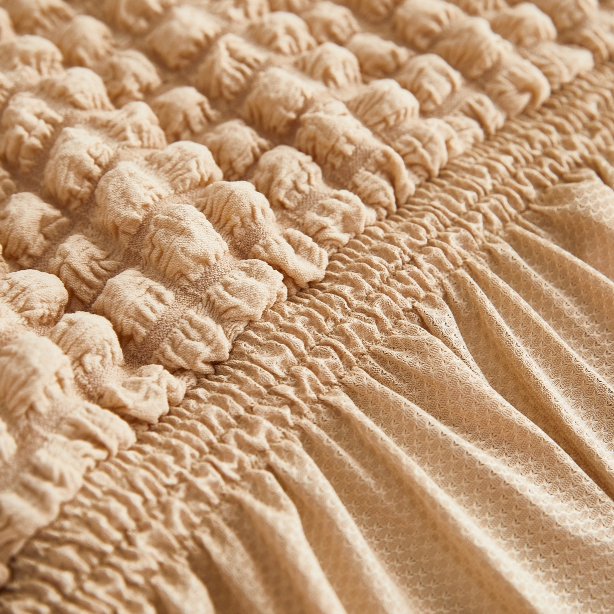 91家纺网 家纺一手货源 找家纺 布兰鸟【沙发套】 2025新款泡泡沙发套四人位【英文裙摆款】 单色米黄