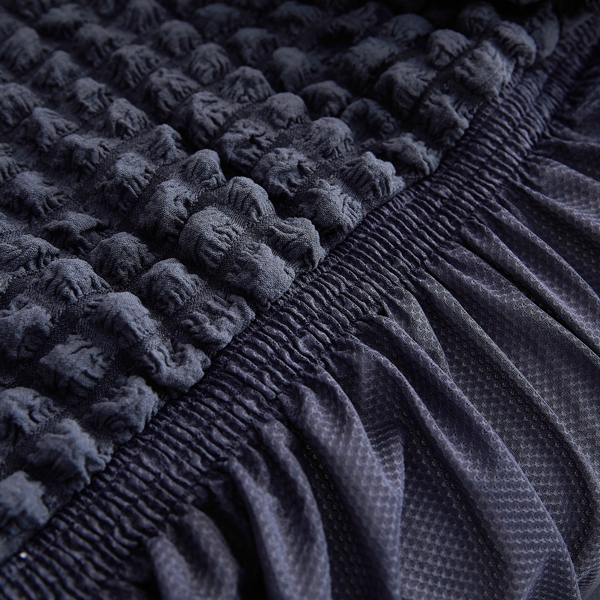 91家纺网 家纺一手货源 找家纺 布兰鸟【沙发套】 2025新款泡泡沙发套四人位【英文裙摆款】 单色深灰