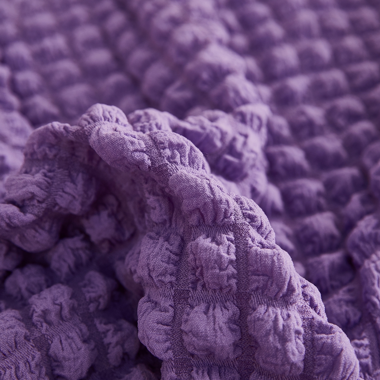 91家纺网 家纺一手货源 找家纺 布兰鸟【沙发套】 2025新款泡泡沙发套组合L型【英文裙摆款】 单色紫