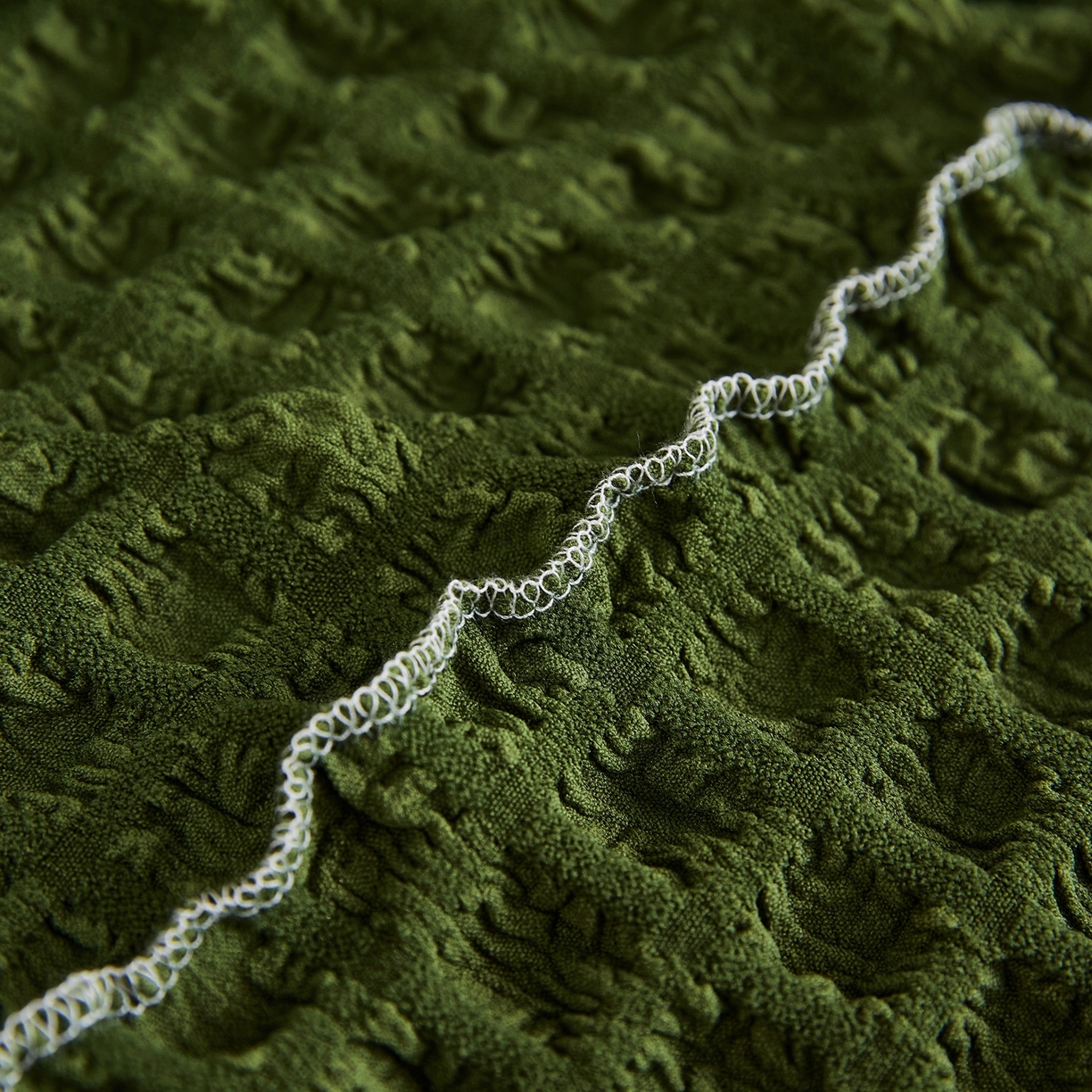 91家纺网 家纺一手货源 找家纺 布兰鸟【沙发套】 2025新款泡泡沙发套组合L型【英文裙摆款】 豆沙绿