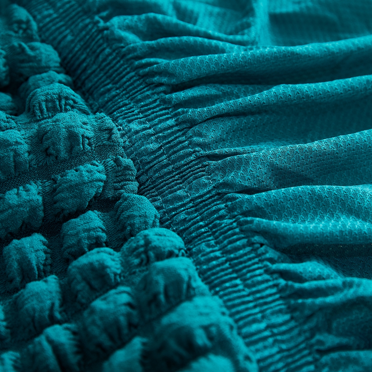 91家纺网 家纺一手货源 找家纺 布兰鸟【沙发套】 2025新款泡泡沙发套组合L型【英文裙摆款】 孔雀蓝