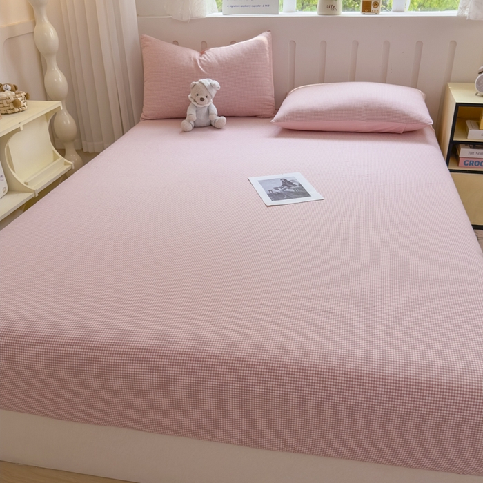 91家纺网 家纺一手货源 找家纺 晚依家纺 2025新款A类色织全棉纯棉水洗棉床笠单件纯棉格子纯色学生宿舍定制定做 密格-浅粉