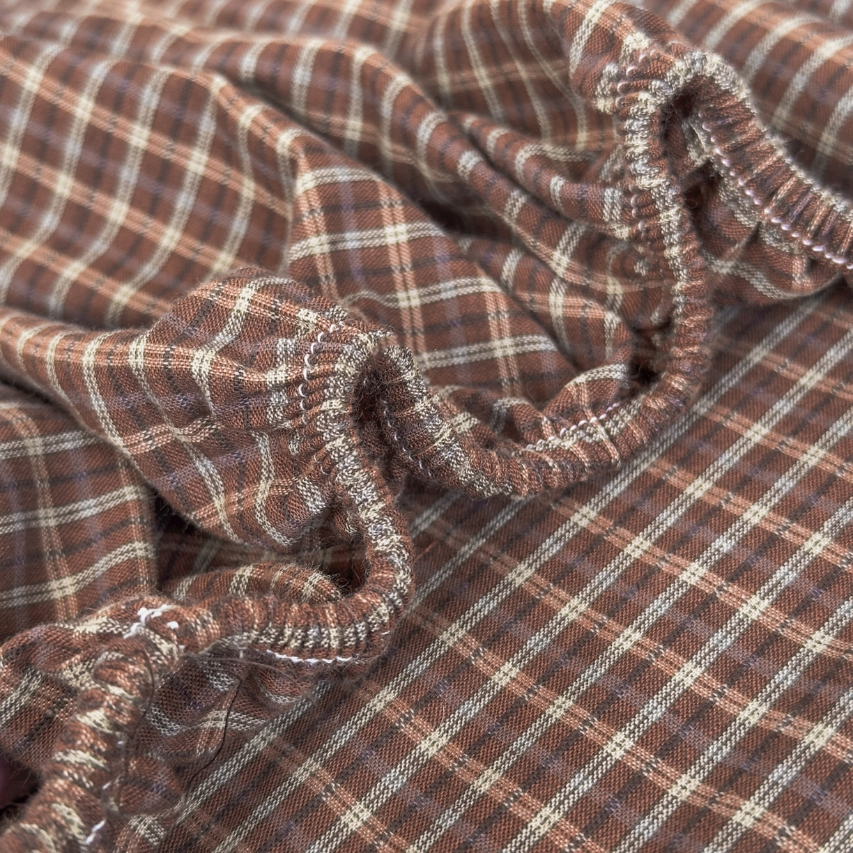 91家纺网 家纺一手货源 找家纺 晚依家纺 2025新款A类色织全棉水洗棉床单单件纯棉格子纯色学生宿舍定制定做 沐风-焦糖