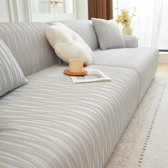 91家纺网 家纺一手货源 找家纺 丝绮鹿 2025新款提花绒沙发套水波纹松紧款 浅灰