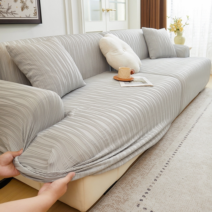 91家纺网 家纺一手货源 找家纺 丝绮鹿 2025新款提花绒沙发套水波纹松紧款 浅灰