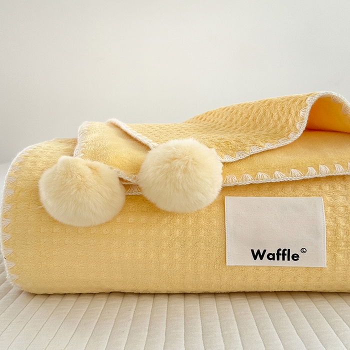 91家纺网 家纺一手货源 找家纺 艾佳 2025新款华夫格升级版毛球款四季毯盖毯毛毯毯子 奶球黄