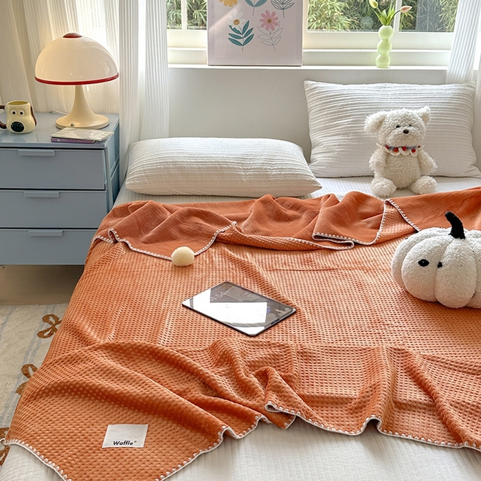 91家纺网 家纺一手货源 找家纺 艾佳 2025新款华夫格升级版毛球款四季毯盖毯毛毯毯子 星光球桔