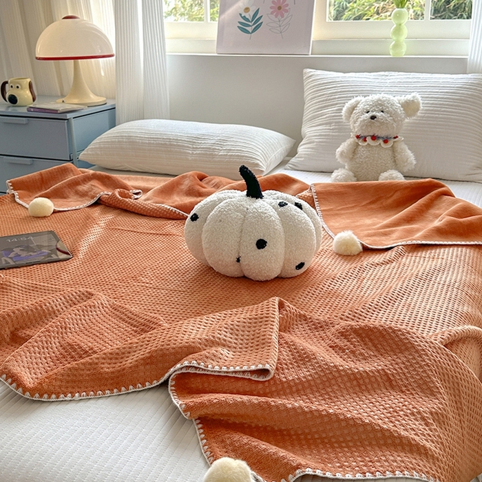 91家纺网 家纺一手货源 找家纺 艾佳 2025新款华夫格升级版毛球款四季毯盖毯毛毯毯子 星光球桔