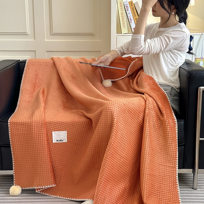 91家纺网 家纺一手货源 找家纺 艾佳 2025新款华夫格升级版毛球款四季毯盖毯毛毯毯子 星光球桔