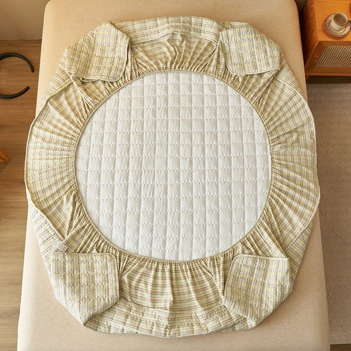 91家纺网 家纺一手货源 找家纺 小萌虎2025新款无印风格水洗棉麻夹棉床笠 绿小格